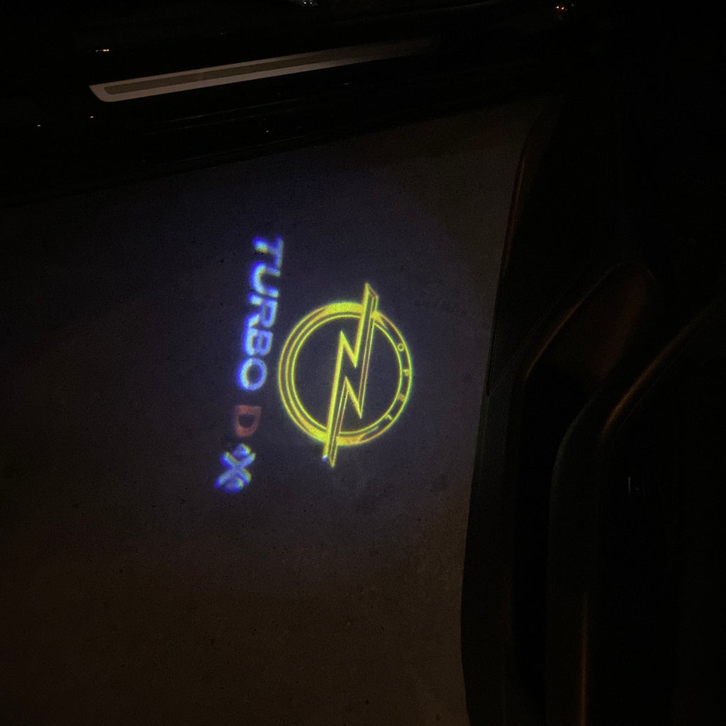 Opel Insignia TURBO LOGO PROJECROTR LIGHTS Nr.1439 (quantity 1 = 1 sets/2 door lights)