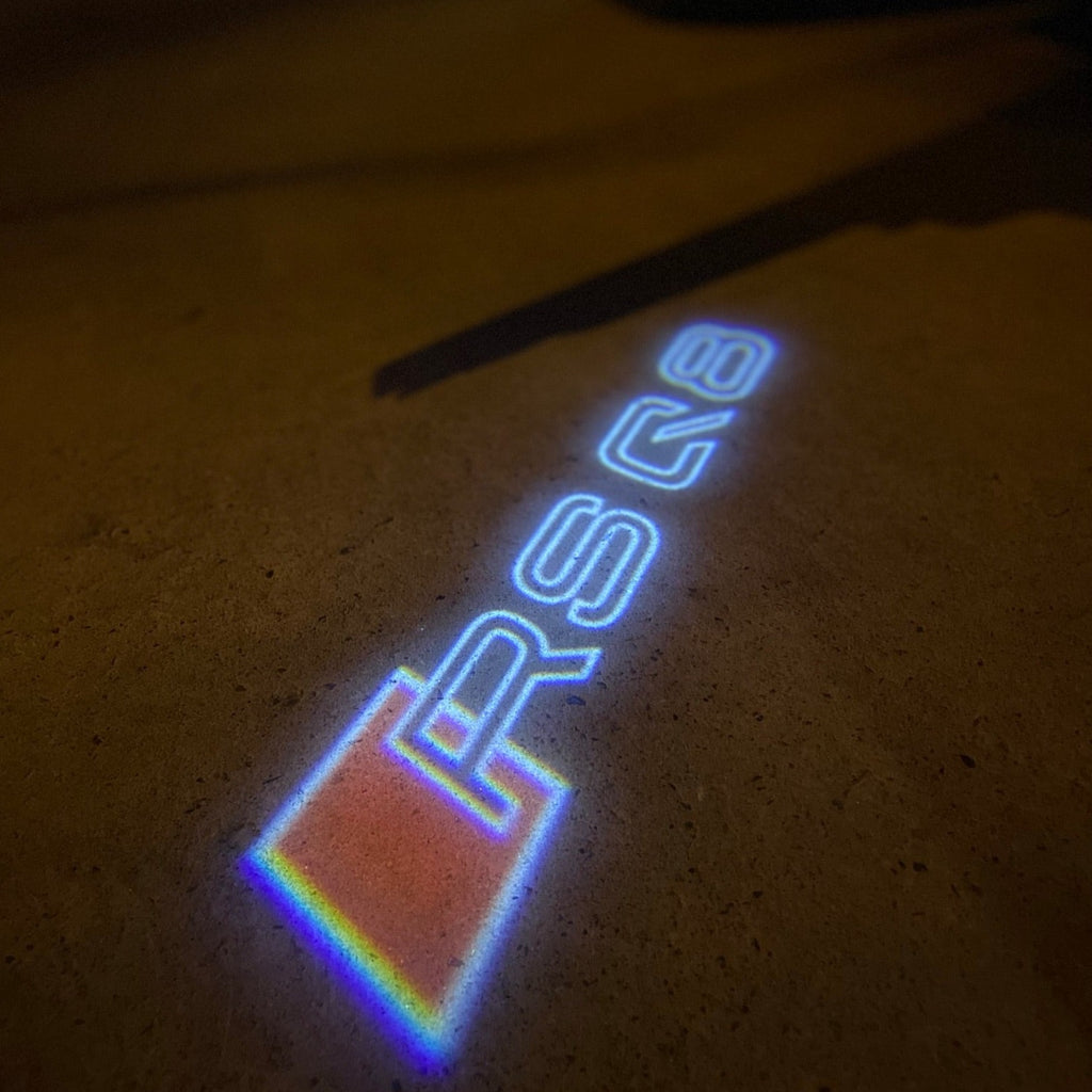 AUDI LOGO PROJECTOT LIGHTS Nr.19 (الكمية 1 = 2 Logo Films /2 أضواء الباب)