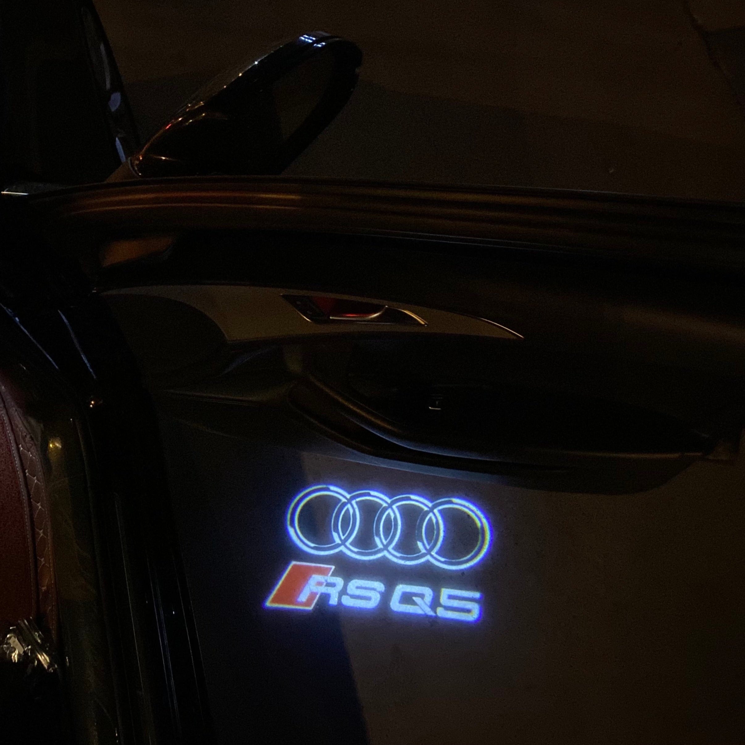 AUDI LOGO PROJECTOT LIGHTS Nr.19 (الكمية 1 = 2 Logo Films /2 أضواء الباب)