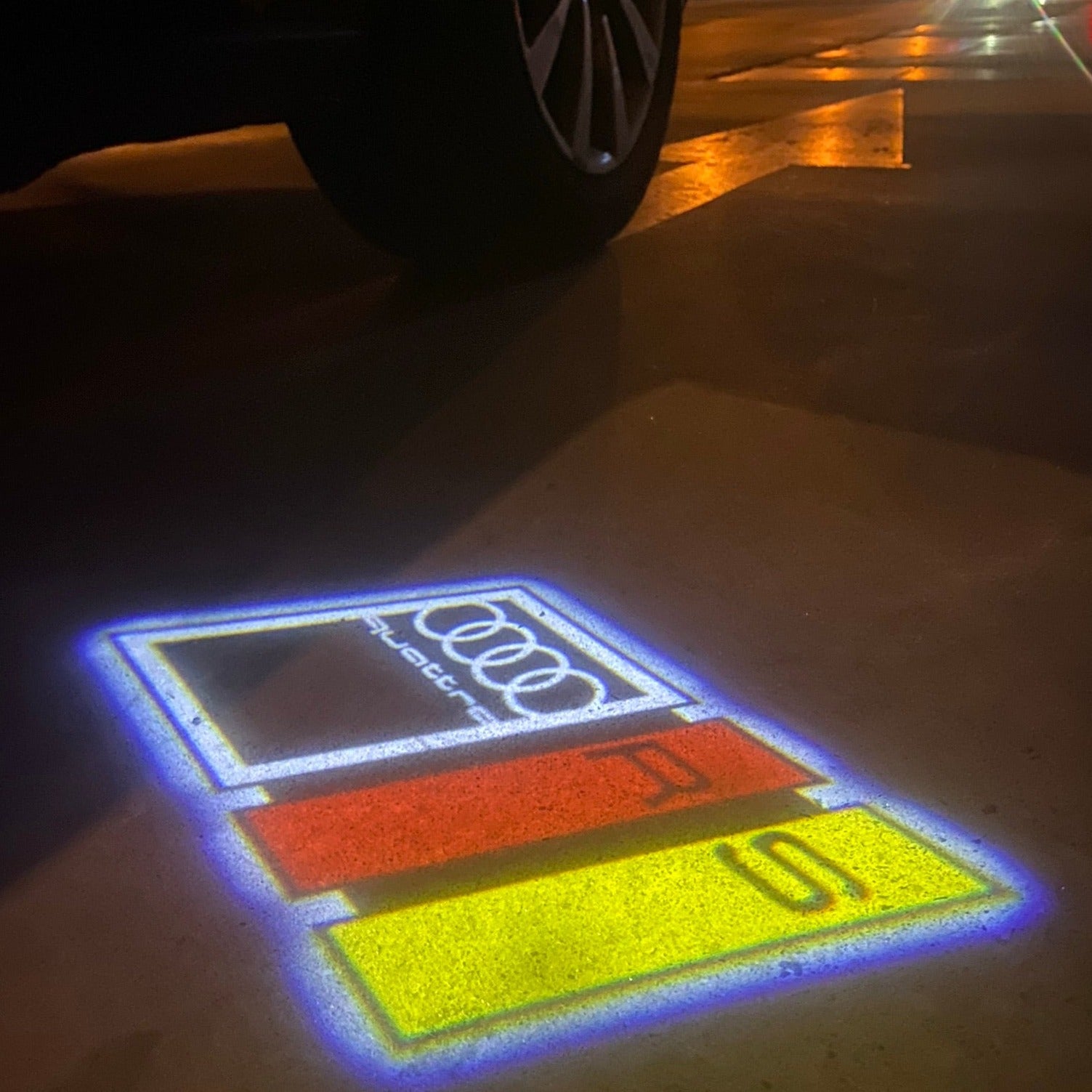 AUDI LOGO PROJECTOT LIGHTS Nr.19 (الكمية 1 = 2 Logo Films /2 أضواء الباب)