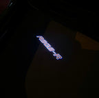 AUDI LOGO PROJECTOT LIGHTS Nr.19 (الكمية 1 = 2 Logo Films /2 أضواء الباب)