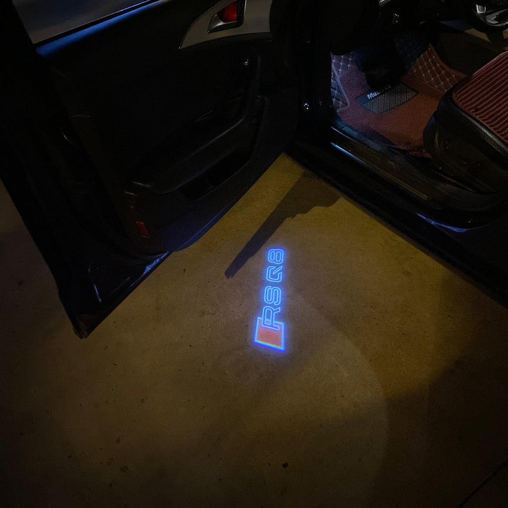 AUDI LOGO PROJECTOT LIGHTS Nr.19 (الكمية 1 = 2 Logo Films /2 أضواء الباب)