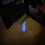 AUDI LOGO PROJECTOT LIGHTS Nr.19 (الكمية 1 = 2 Logo Films /2 أضواء الباب)