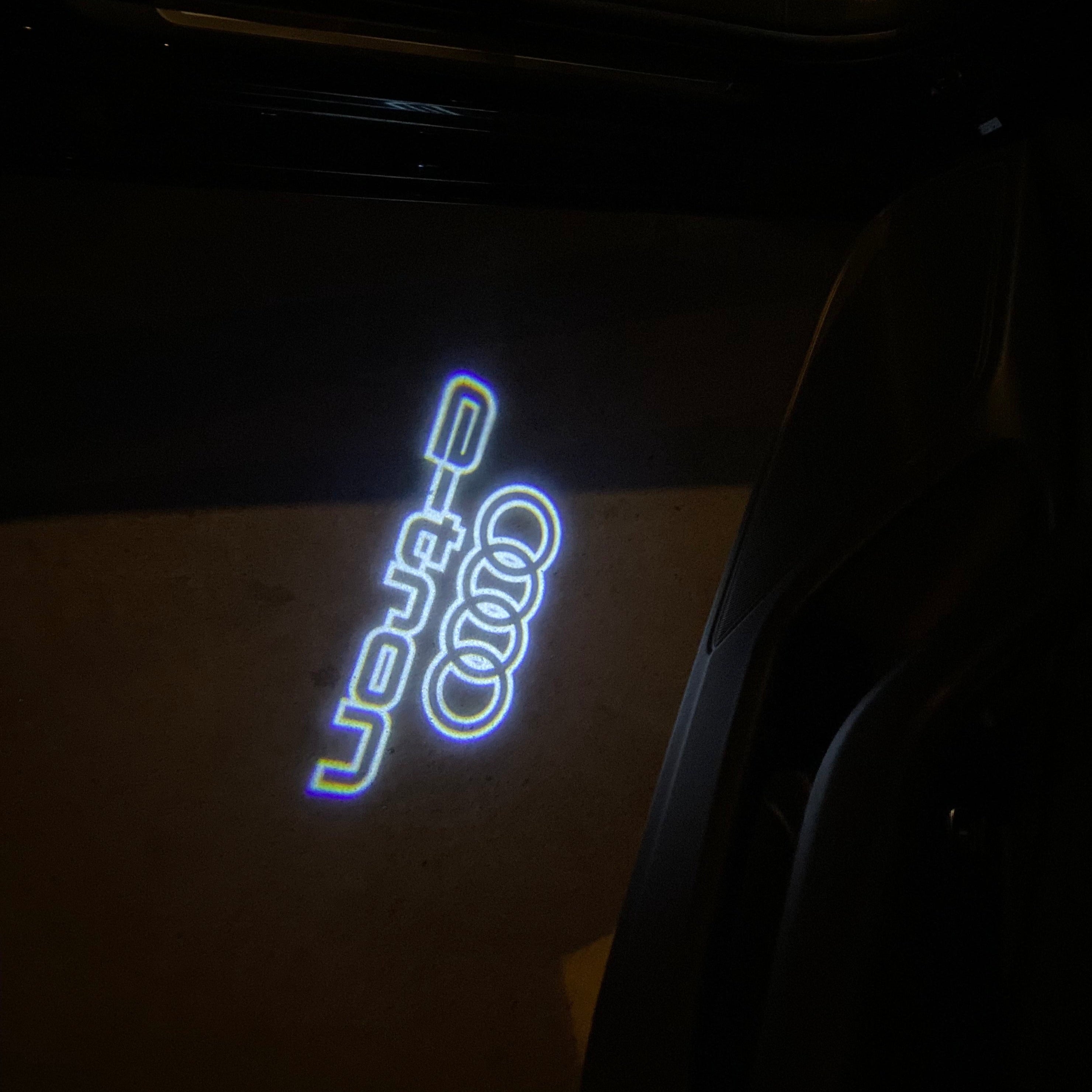 AUDI LOGO PROJECTOT LIGHTS Nr.19 (الكمية 1 = 2 Logo Films /2 أضواء الباب)