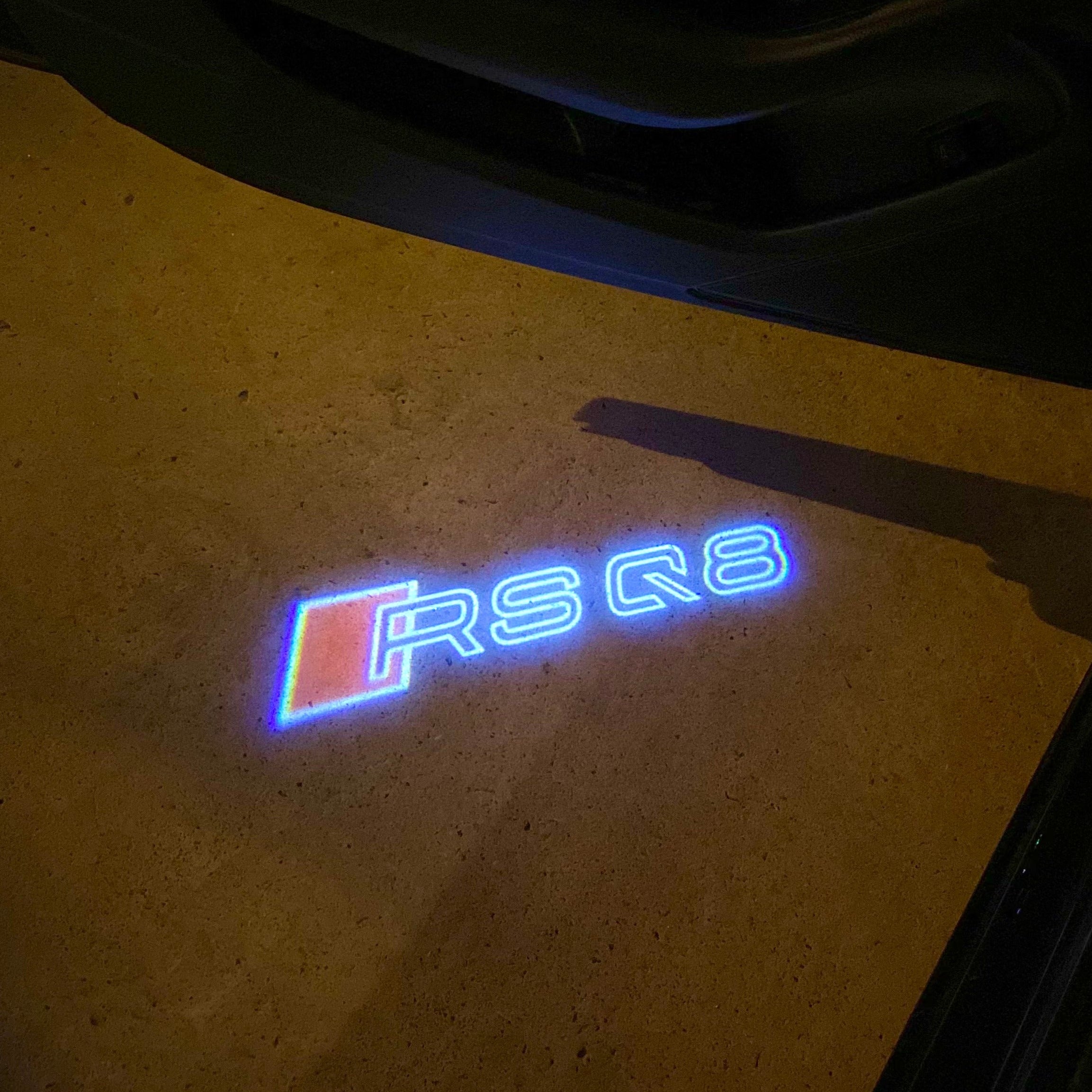 AUDI LOGO PROJECTOT LIGHTS Nr.19 (الكمية 1 = 2 Logo Films /2 أضواء الباب)