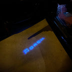 AUDI LOGO PROJECTOT LIGHTS Nr.19 (الكمية 1 = 2 Logo Films /2 أضواء الباب)