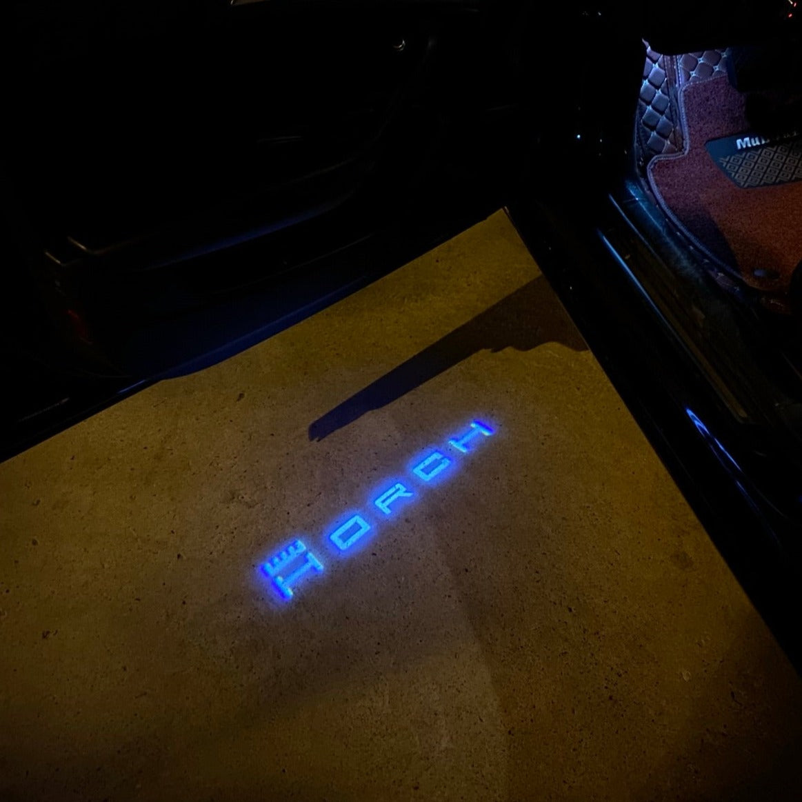 AUDI LOGO PROJECTOT LIGHTS Nr.19 (الكمية 1 = 2 Logo Films /2 أضواء الباب)