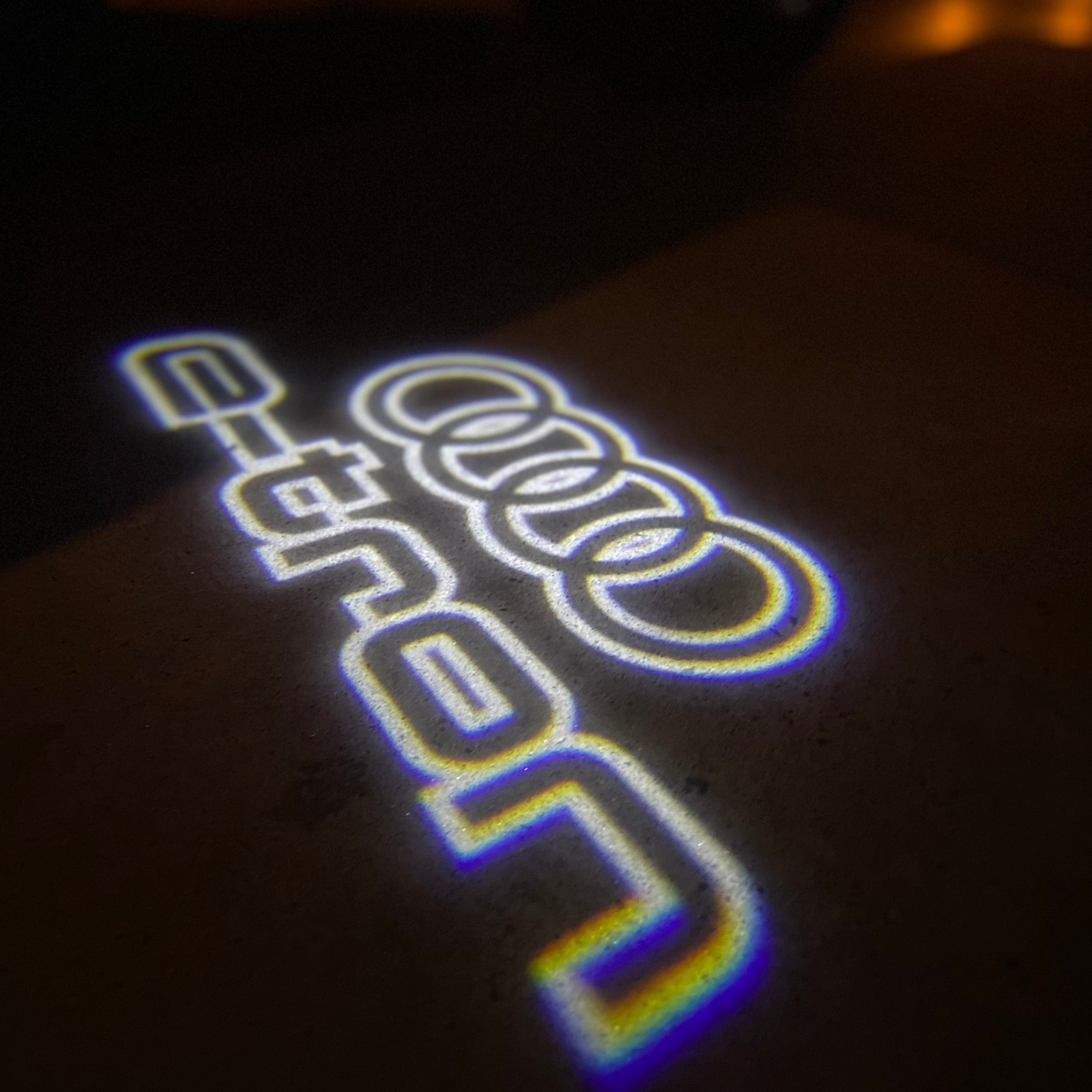 AUDI LOGO PROJECTOT LIGHTS Nr.19 (الكمية 1 = 2 Logo Films /2 أضواء الباب)