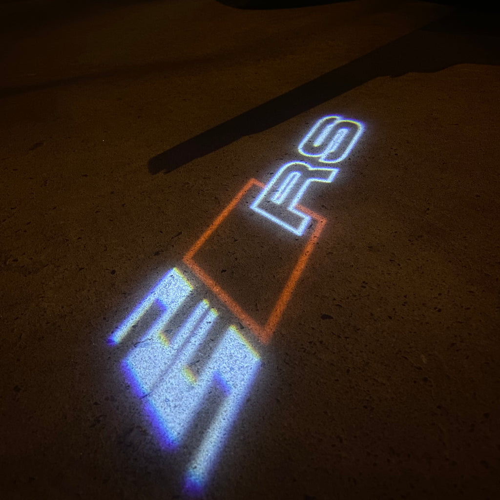 AUDI LOGO PROJECTOT LIGHTS Nr.19 (الكمية 1 = 2 Logo Films /2 أضواء الباب)