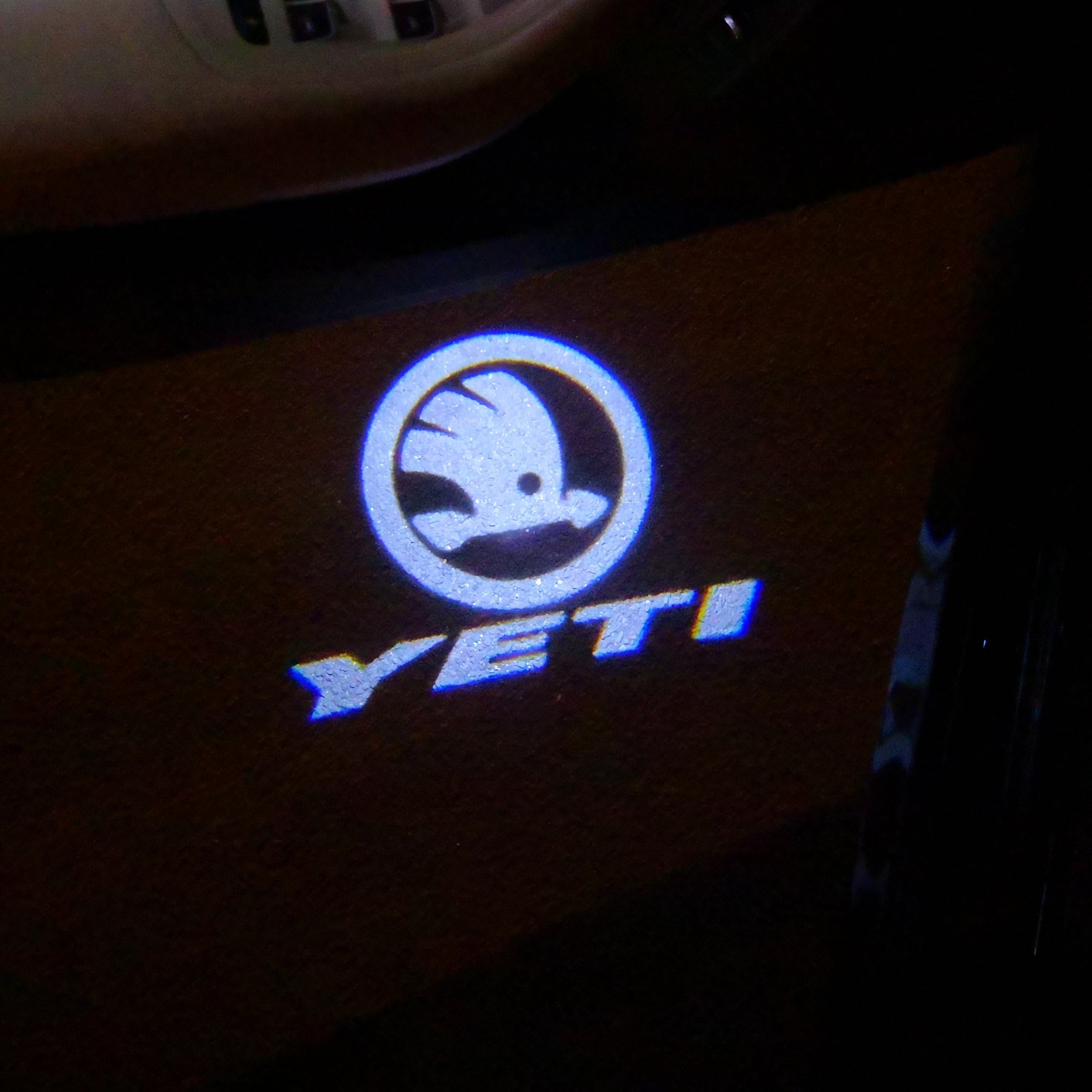 SKODA YETI LOGO  LIGHTS Nr.53 (quantity  1 =  2 Logo Film /  2 door lights)