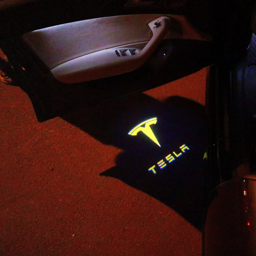 TESLA LOGO PROJECROTR LIGHTS Nr.1512 (quantity  1 =  2 Logo Film /  2 door lights)