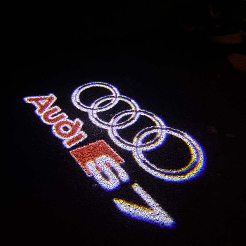 أضواء جهاز عرض شعار AUDI رقم 37 (الكمية 1 = 2 فيلم شعار / 2 مصباح باب)