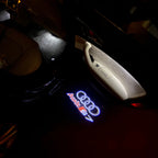 أضواء جهاز عرض شعار AUDI رقم 37 (الكمية 1 = 2 فيلم شعار / 2 مصباح باب)