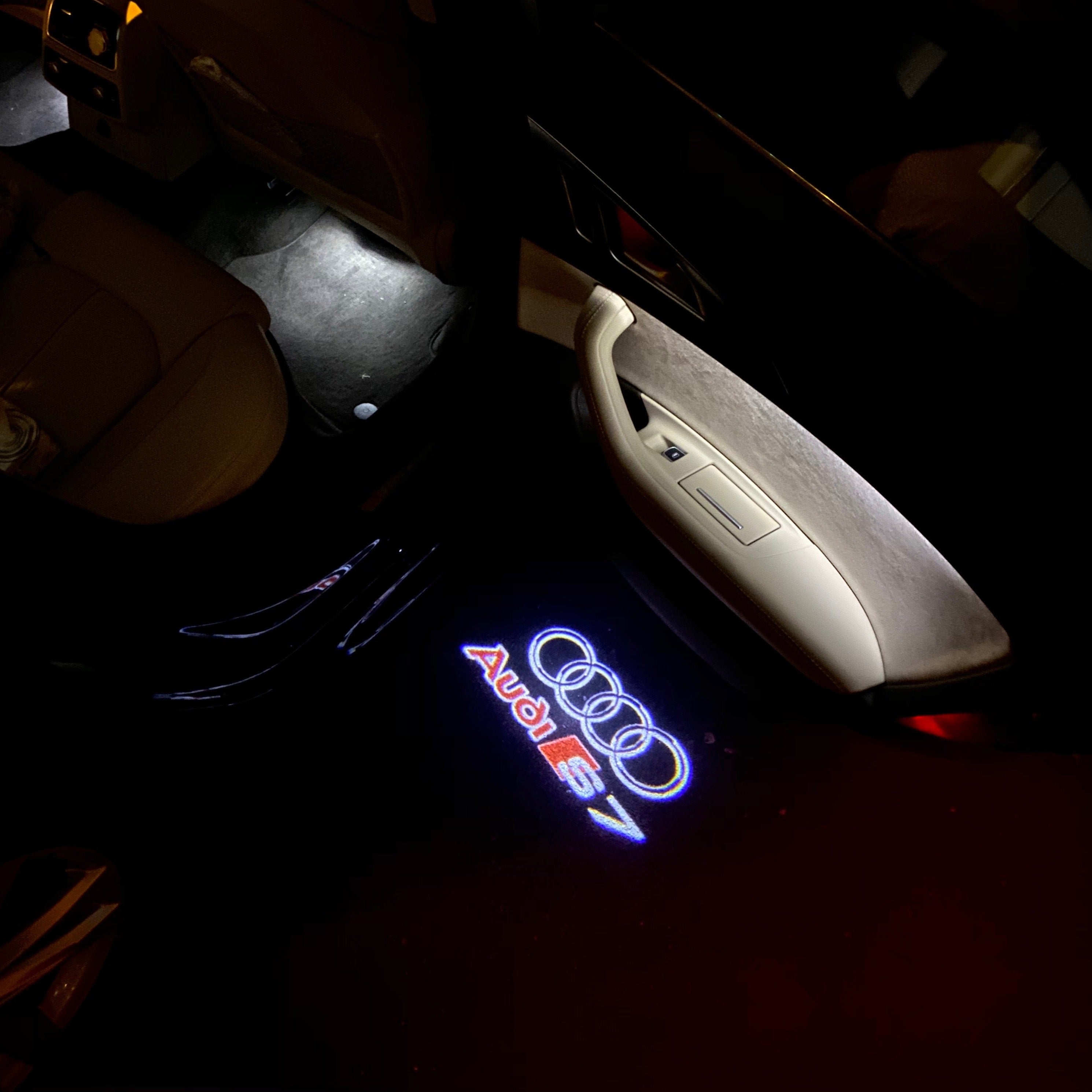 أضواء جهاز عرض شعار AUDI رقم 37 (الكمية 1 = 2 فيلم شعار / 2 مصباح باب)