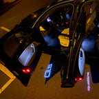 AUDI LOGO PROJECTOT LIGHTS Nr.101 (الكمية 1 = 2 Logo Films /2 أضواء الباب)
