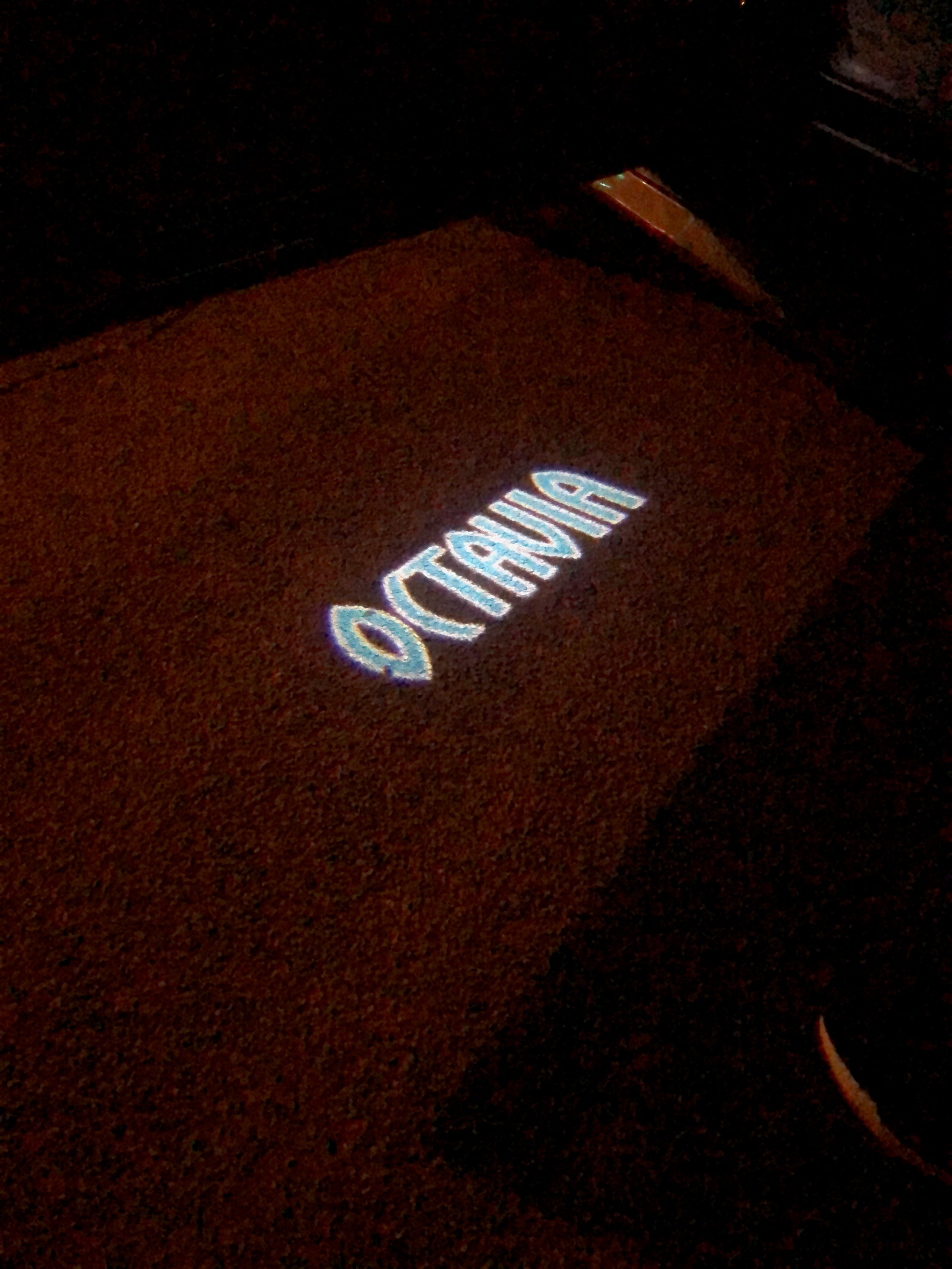 SKODA OCTAVIA LOGO PROJECTOT LIGHTS Nr.83  (quantity  1 =  2 Logo Film /  2 door lights)