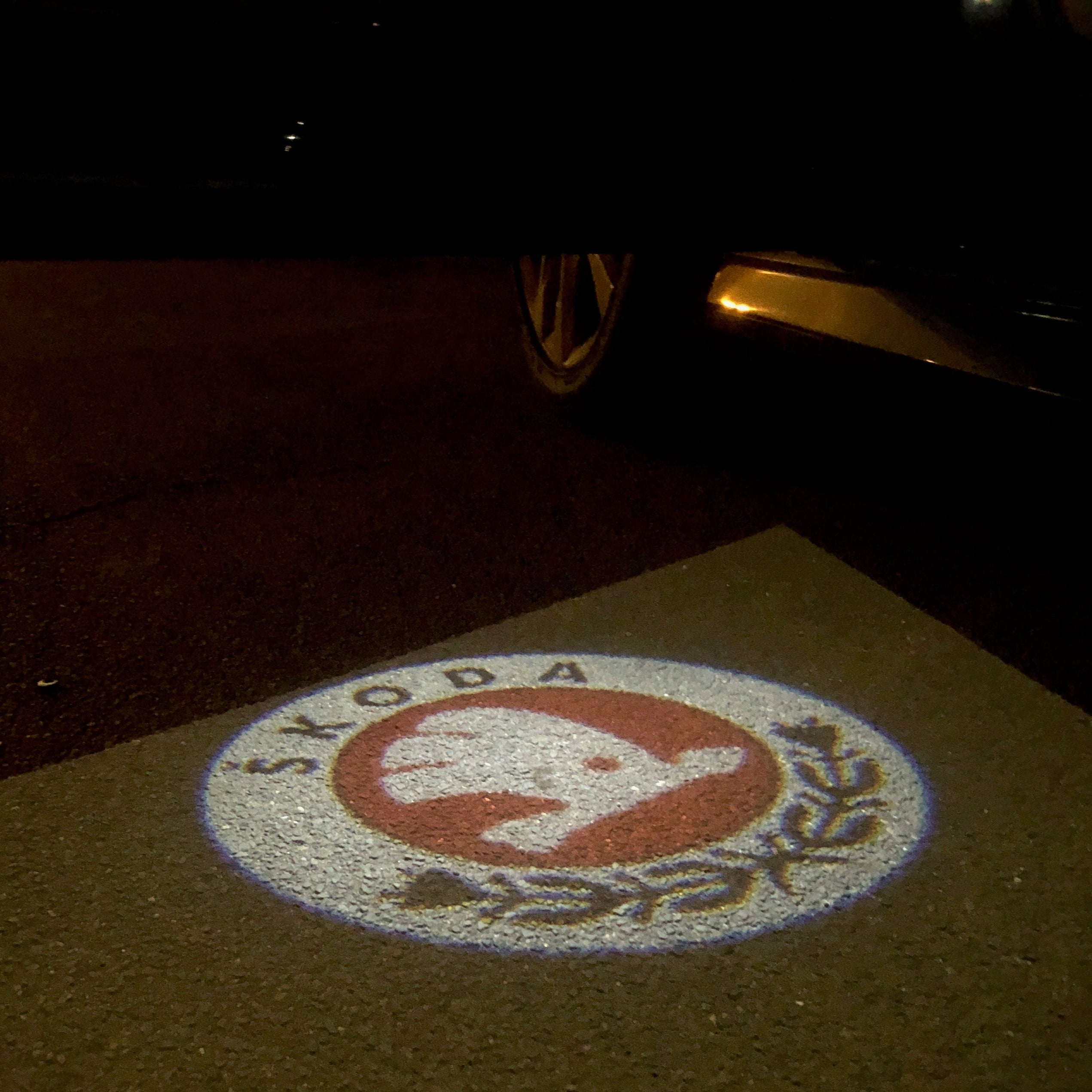 SKODA ORIGINAL LOGO PROJECTOT LIGHTS Nr.12(quantity  1 =  2 Logo Film /  2 door lights)