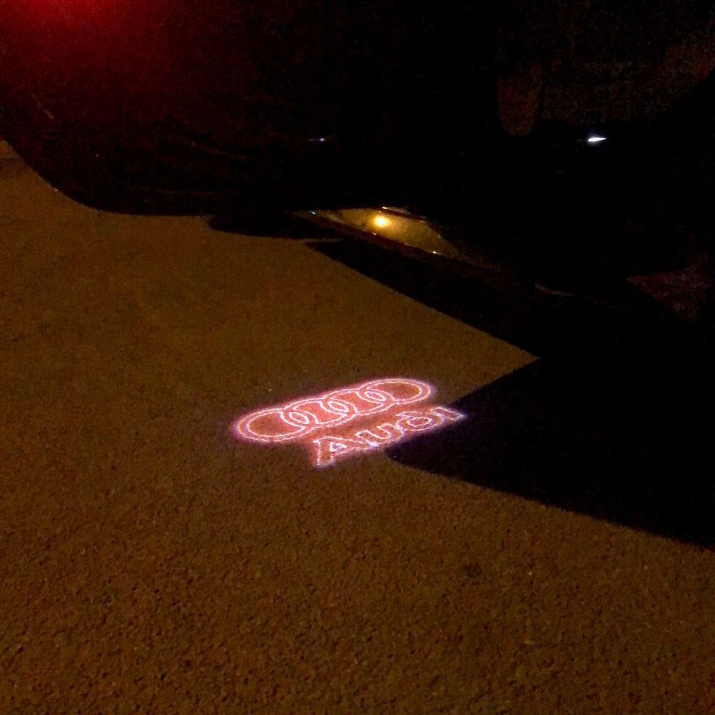 AUDI LOGO PROJECTOT LIGHTS Nr.19 (الكمية 1 = 2 Logo Films /2 أضواء الباب)