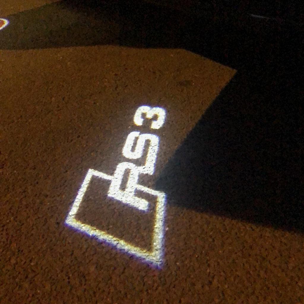 AUDI LOGO PROJECTOT LIGHTS Nr.120 (الكمية 1 = 2 Logo Films /2 أضواء الباب)