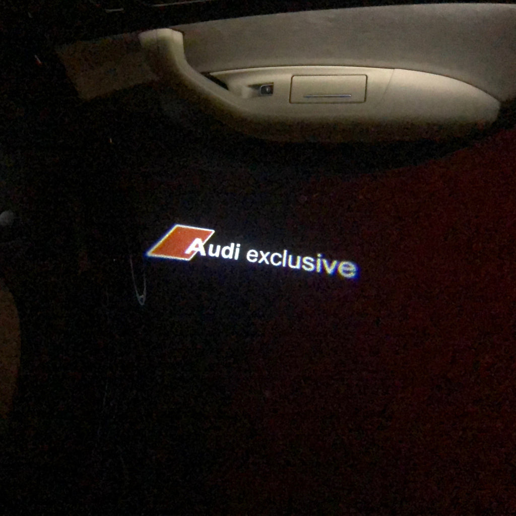 AUDI LOGO PROJECTOT LIGHTS Nr.70 (الكمية 1 = 2 Logo Films /2 أضواء الباب)