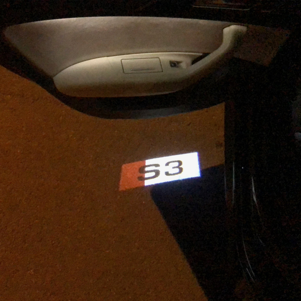 AUDI LOGO PROJECTOT LIGHTS Nr.129 (الكمية 1 = 2 شعار الأفلام / 2 أضواء الباب)