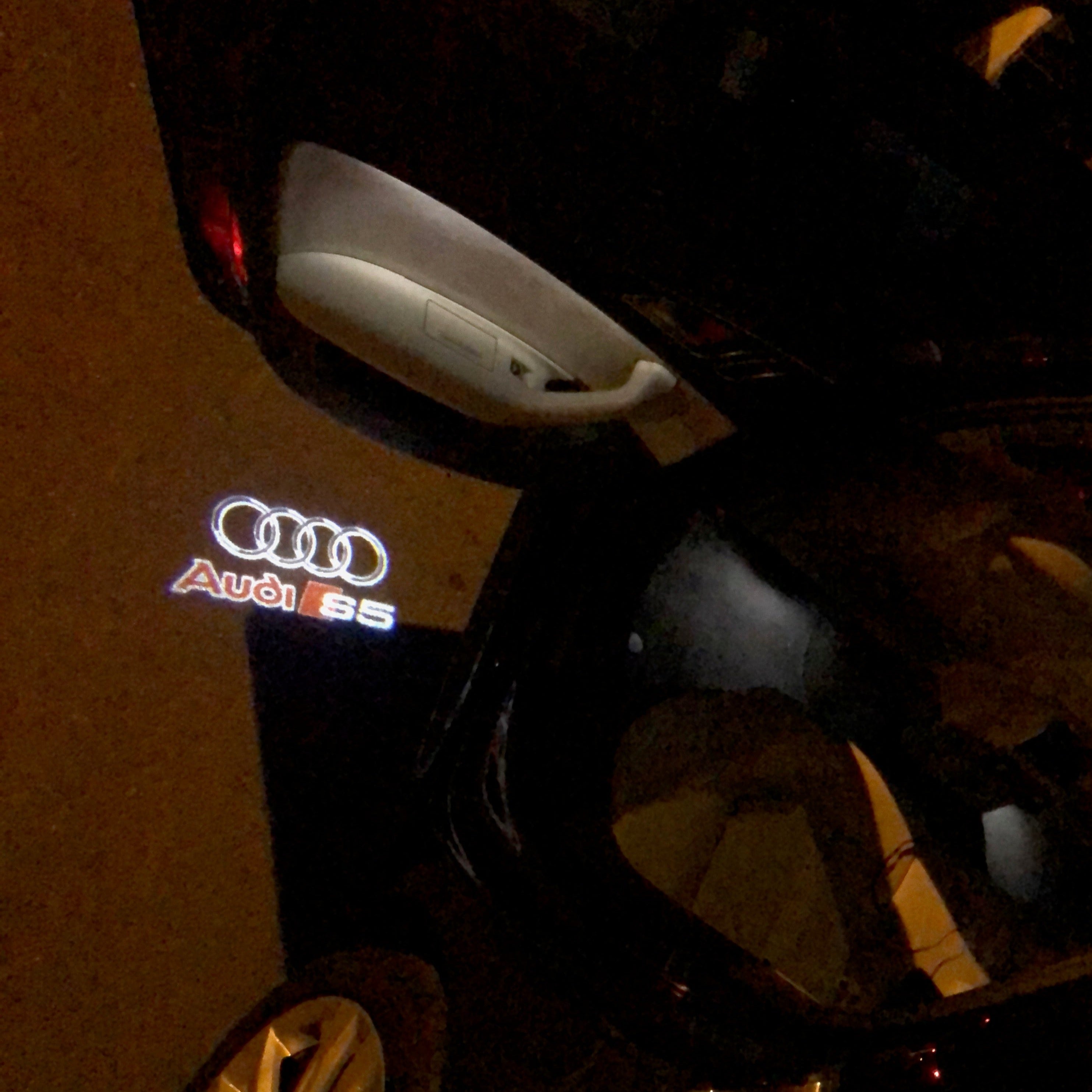 AUDI LOGO PROJECTOT LIGHTS Nr.35 (الكمية 1 = 2 Logo Films /2 أضواء الباب)