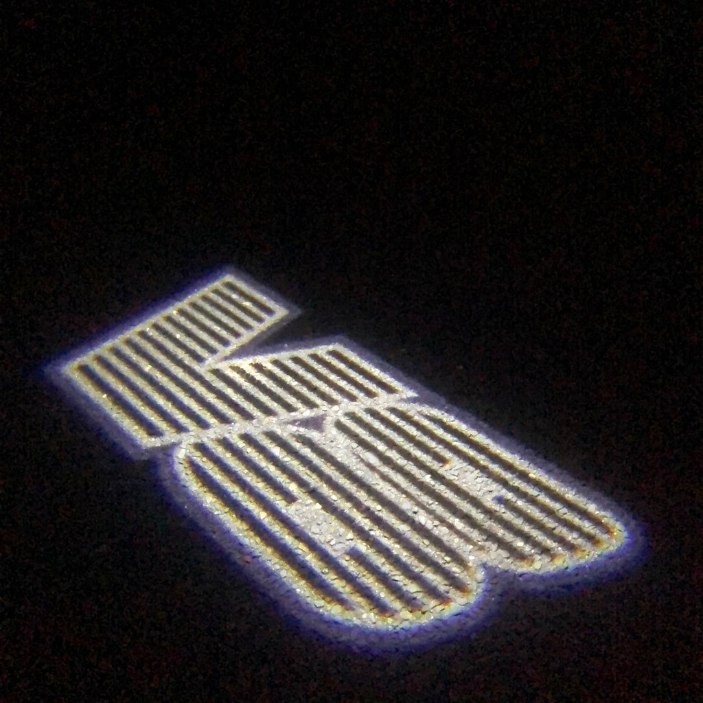 AUDI LOGO PROJECTOT LIGHTS Nr.19 (الكمية 1 = 2 Logo Films /2 أضواء الباب)