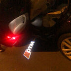 AUDI LOGO PROJECTOT LIGHTS Nr.113 (الكمية 1 = 2 Logo Films /2 أضواء الباب)