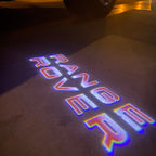 Land Rover LOGO PROJECROTR LIGHTS Nr.04 (الكمية 1 = 1 مجموعة / 2 أضواء باب)