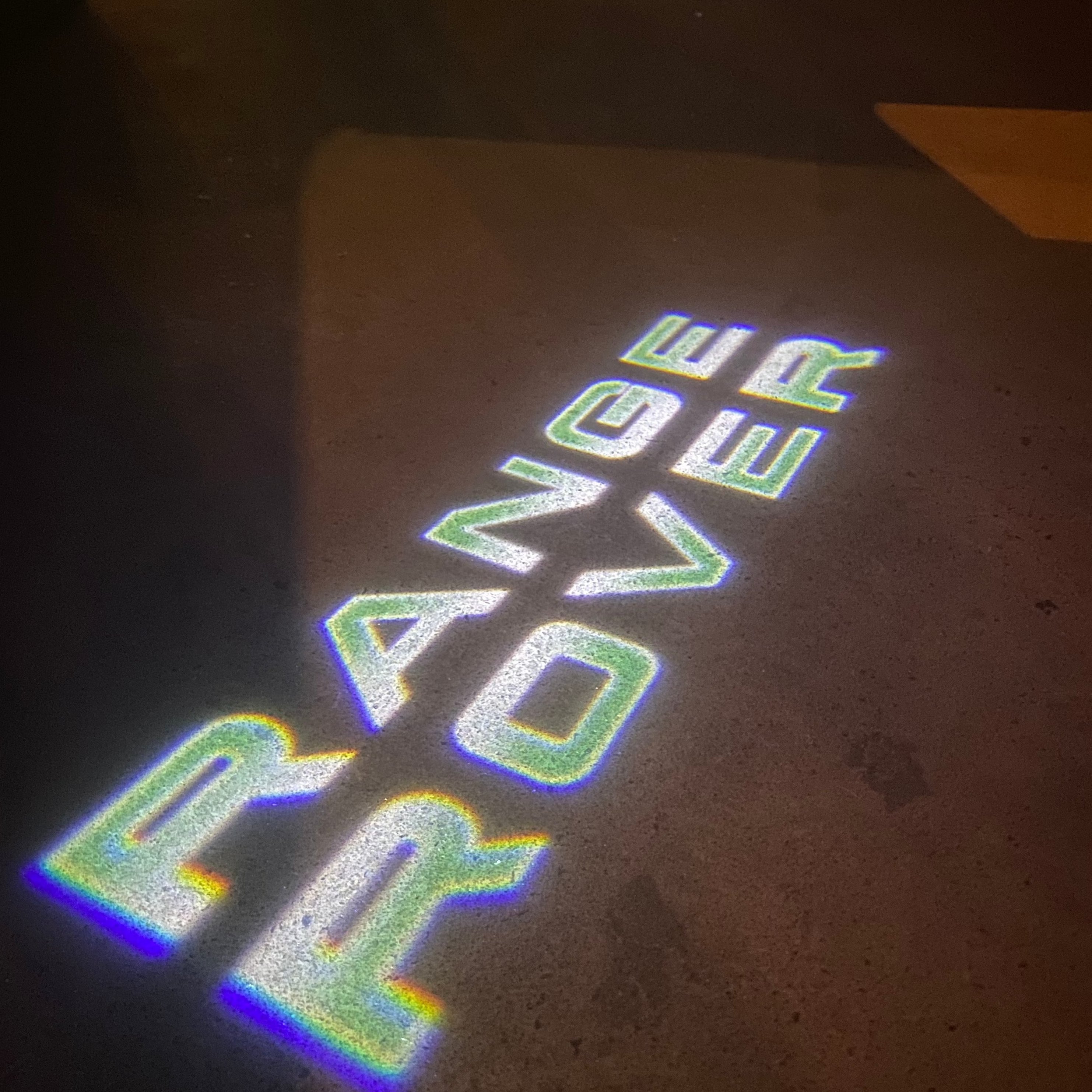 Land Rover LOGO PROJECROTR LIGHTS Nr.04 (الكمية 1 = 1 مجموعة / 2 أضواء باب)