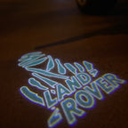 Land Rover LOGO PROJECROTR LIGHTS Nr.04 (الكمية 1 = 1 مجموعة / 2 أضواء باب)